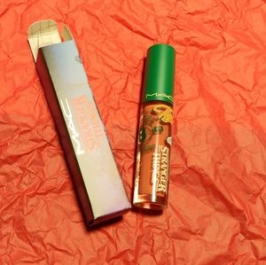 MAC Cosmetics Stranger Things Lipglass in Eerie El (warm pink nude)